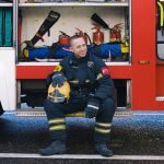 best degrees for firefighters Photo by Anna Shvets: https://www.pexels.com/photo/man-smiling-while-sitting-on-running-board-of-a-fire-truck-5965020/