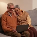 best degrees for older adults Photo by Marcus Aurelius: https://www.pexels.com/photo/man-and-woman-sitting-on-sofa-while-looking-at-a-laptop-6787969/