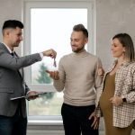 degrees for real estate Photo by Alena Darmel: https://www.pexels.com/photo/a-real-estate-agent-handing-the-key-to-the-new-homeowners-7641899/
