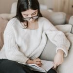 degrees for writers Photo by Vlada Karpovich: https://www.pexels.com/photo/focused-young-woman-writing-agenda-in-diary-4050341/