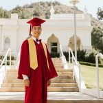 how to graduate high school with an associate's degree Photo by RDNE Stock project: https://www.pexels.com/photo/a-man-in-red-academic-regalia-standing-on-a-concrete-stairs-7713135/