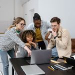 4 entrepreneurs working on a project together 1